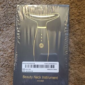 Black and Gold Beauty Neck Device